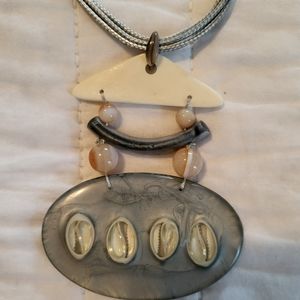 This necklace is about 17" long, however it is adjustable.